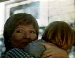 Aunt Cheryl (Susan Tyrell) waves off her sister, and her husband, whilst clutching onto young Billy...