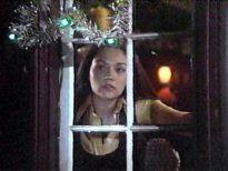 Olivia Hussey peers out onto the Winter Wonderland