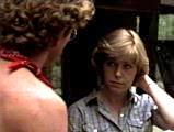 Alice (Adrienne King) makes doe eyes at the camp chief, Steve (Peter Brouwer)