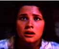 Kelly (Daphne Zuniga) awakes from a horrible nightmare where...