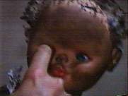 No self respecting giallo can be without some display of eye violence- especially if it's directed towards a doll!
