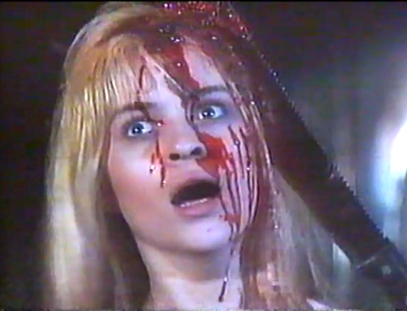 One of the few things that CHARLY: DAYS OF BLOOD has going for it is some cheap, but half decent gore gags