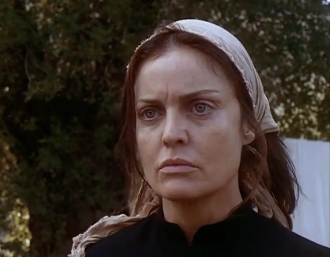 Tracy Scoggins, like Gary Busey, gets top-billing in A CRACK IN THE FLOOR, but is only in the movie for 5 minutes tops.