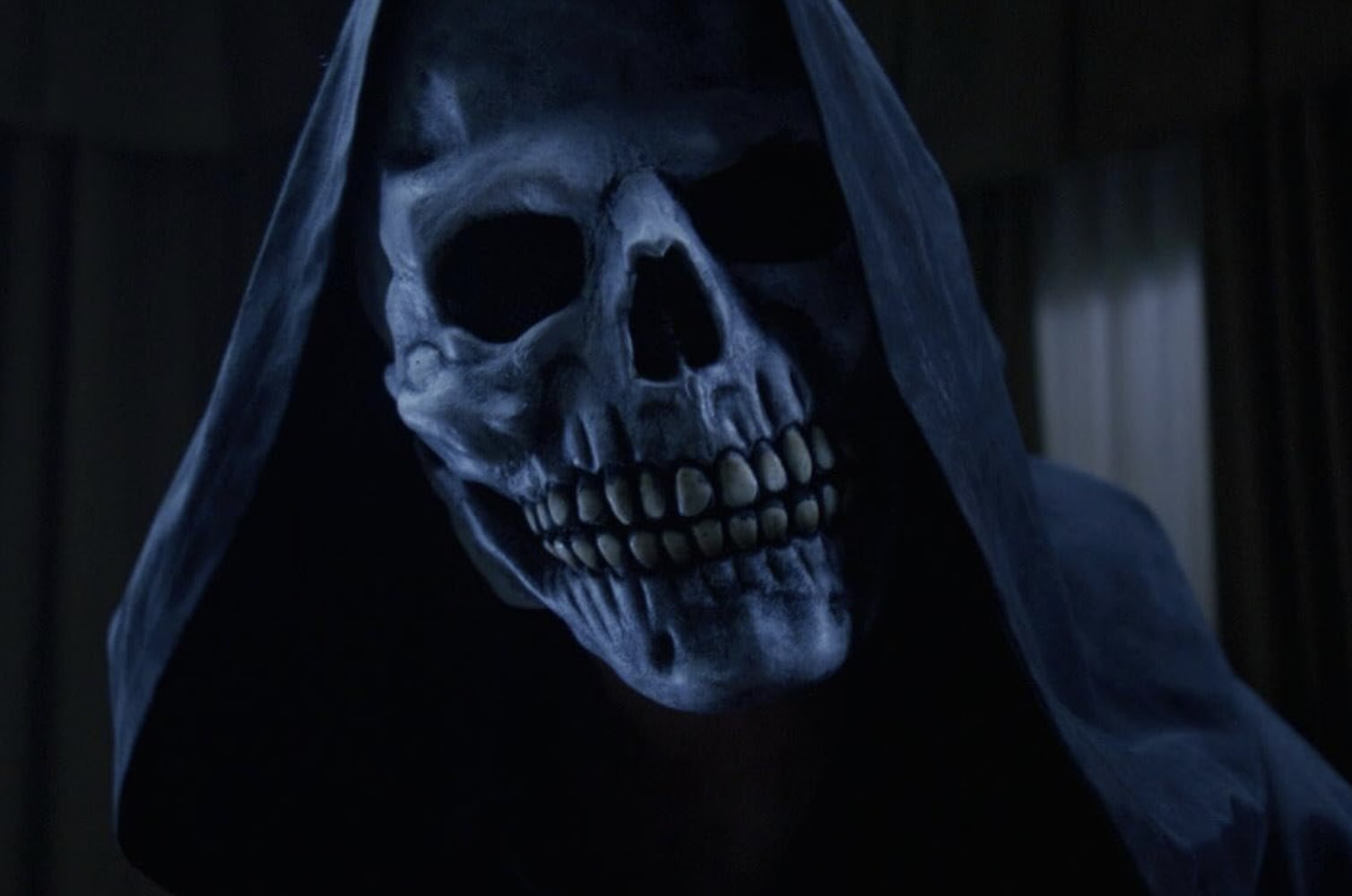 NIGHT OF THE REAPER features a skull-faced killer who films their murders on VHS