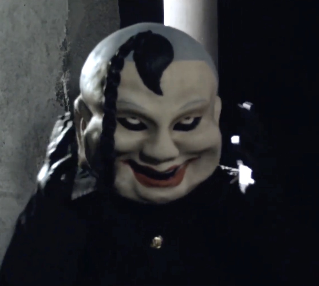 BLOODY DOLL features a super creepy killer&apos;s mask