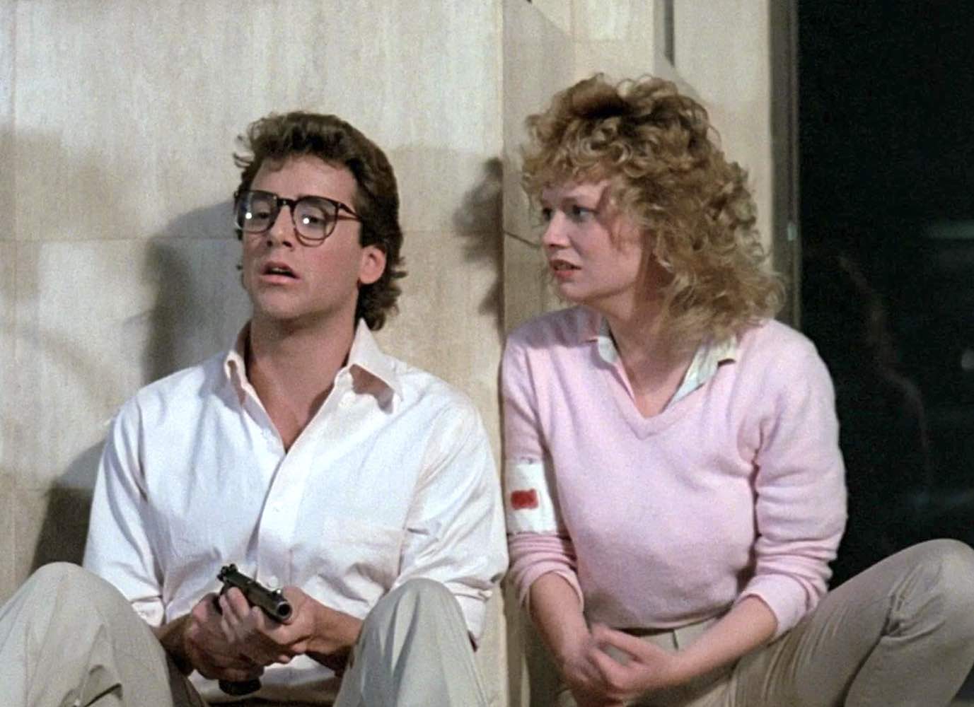 Tony O&apos;Dell and Kelli Maroney face off against the killbots in CHOPPING MALL