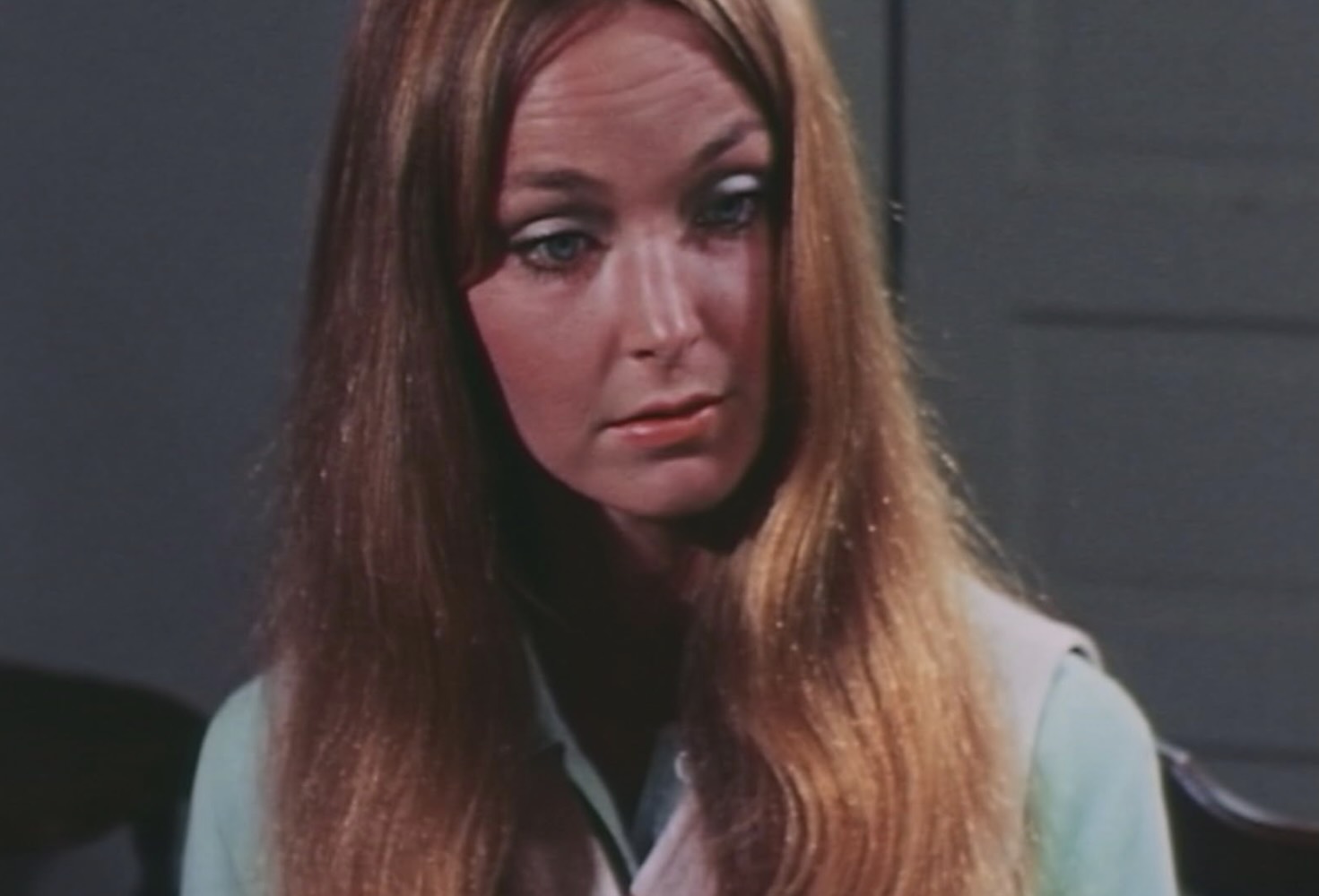 Rosie Holotik as the hapless nurse in DON'T LOOK IN THE BASEMENT.