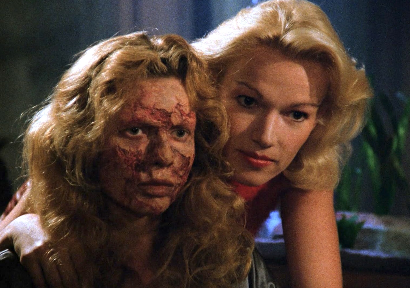 When Ingrid (Christiane Jean) loses face Nathalie (Brigette Lahaie) helps her get a new one in FACELESS