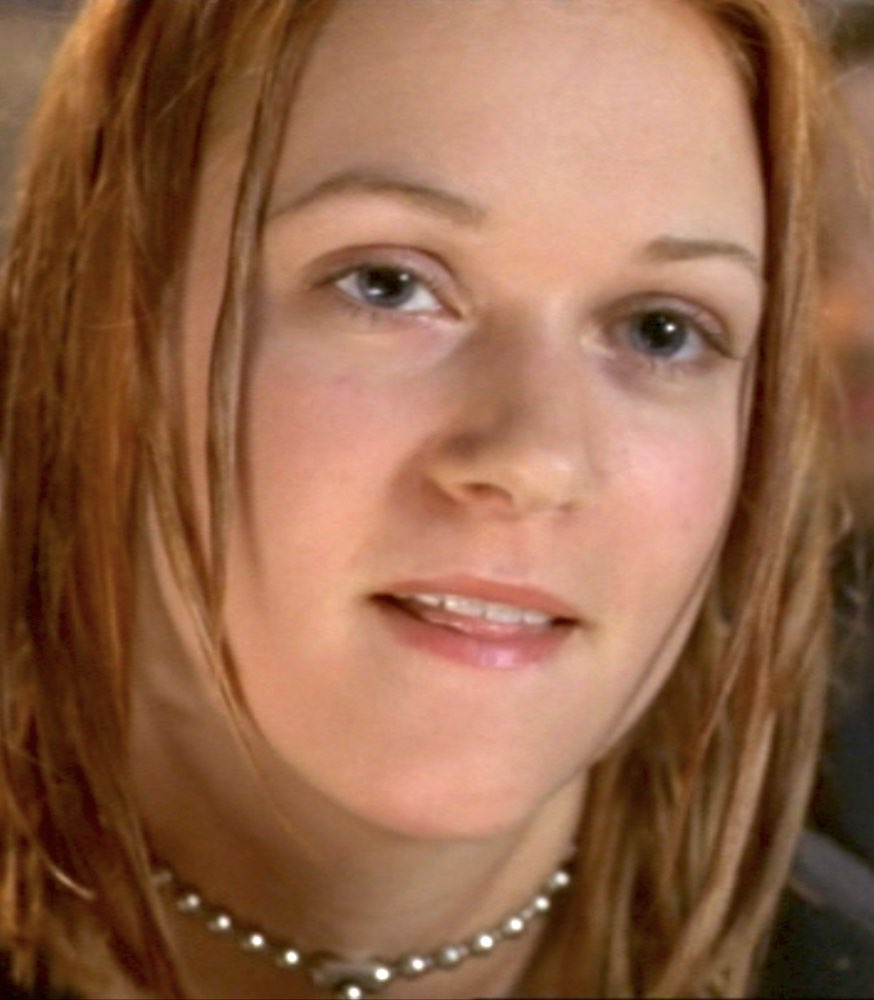 A. J. Cook plays Molly Keller, a massacre survivor who investigates new killings in director John Eyres slasher movie RIPPER: LETTER FROM HELL (2001)