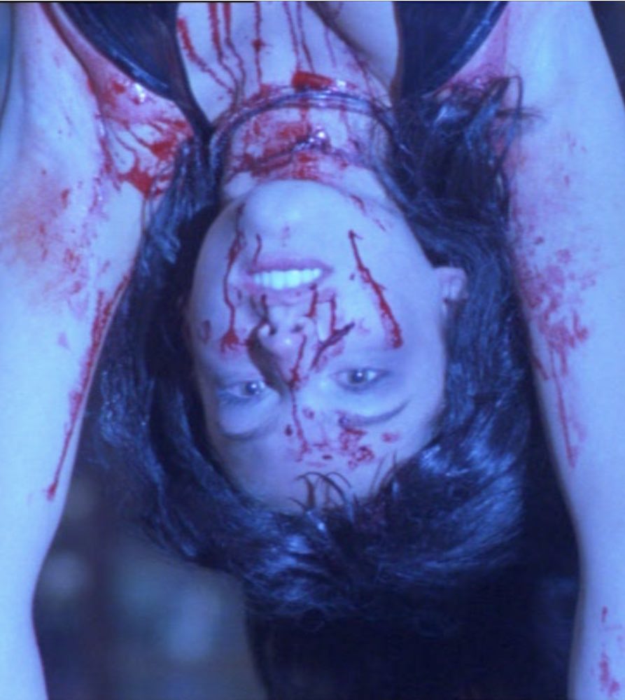 Kelly Brook’s character meets a messy end in John Eyres slasher movie RIPPER: LETTER FROM HELL (2001)
