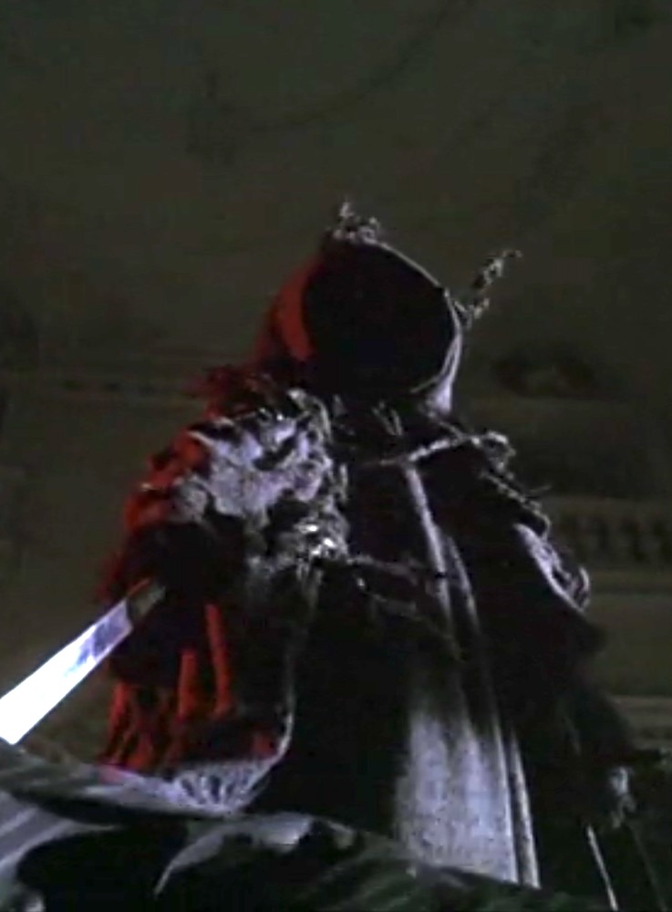 The hooded killer in the slasher sequel RIPPER 2: LETTER FROM WITH (2004).